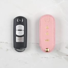https://cdnmedia.storyleather.com/catalog/product/cache/3275a459b11147ad46cd529b1066a457/c/o/coaster-pink-leather-key-cover-for-mazda-smart-keyless-remote-stand.jpg